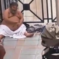 Naked man saying obscenities to passing women.