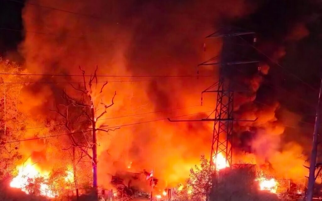 140 cars gutted in huge fire at Gatwick holiday parking site: Pensioner, 67, arrested on arson suspicion
