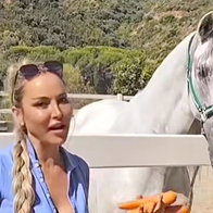 Victoria with one of the saved horses.