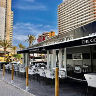 A restaurant with seating area outside in Benidorm, Spain