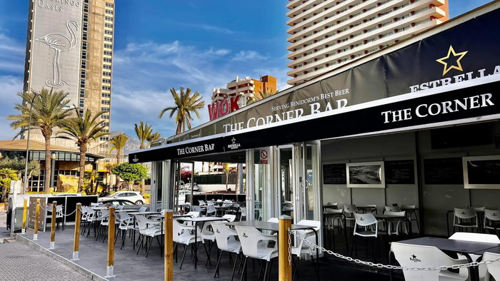 A restaurant with seating area outside in Benidorm, Spain