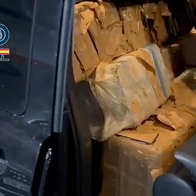 Bundles of cocaine wrapped in tape and stacked inside a car seat, photographed by Policía Nacional during a drugs raid.