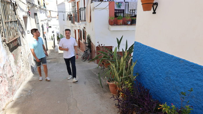 Mayor Oscar Medina inspects old town.
