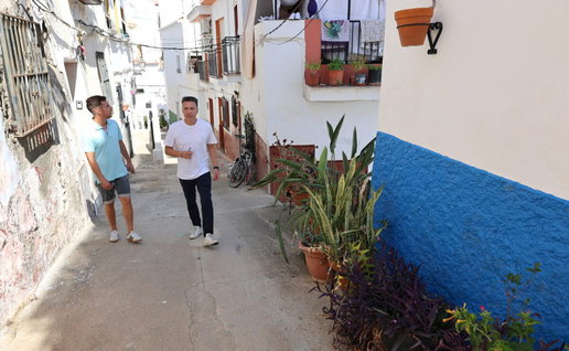 Mayor Oscar Medina inspects old town.