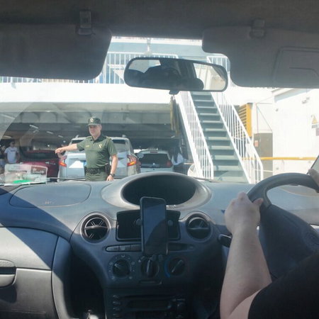 Ferry checks by Guardia Civil officer on goods carried.