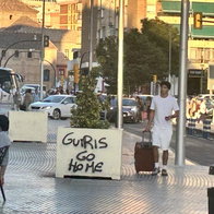 Graffiti appearing around Malaga reading "Guiris go home" following recent housing protests.