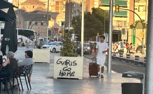 Graffiti appearing around Malaga reading "Guiris go home" following recent housing protests.