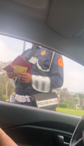 Moroccan Police officer writing a fine