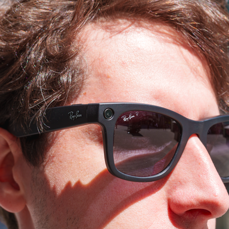 The upper face of a man wearing Meta AI glasses