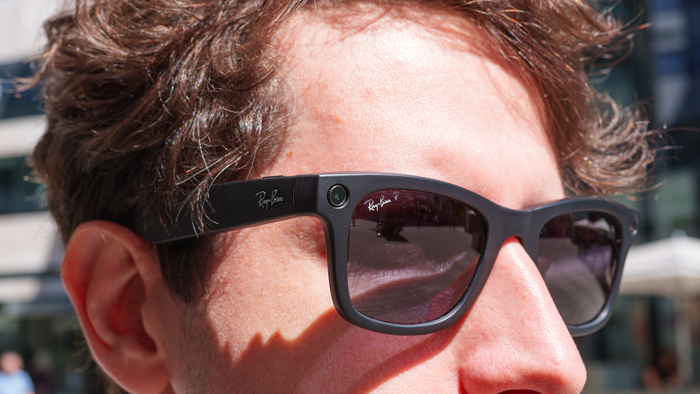 The upper face of a man wearing Meta AI glasses