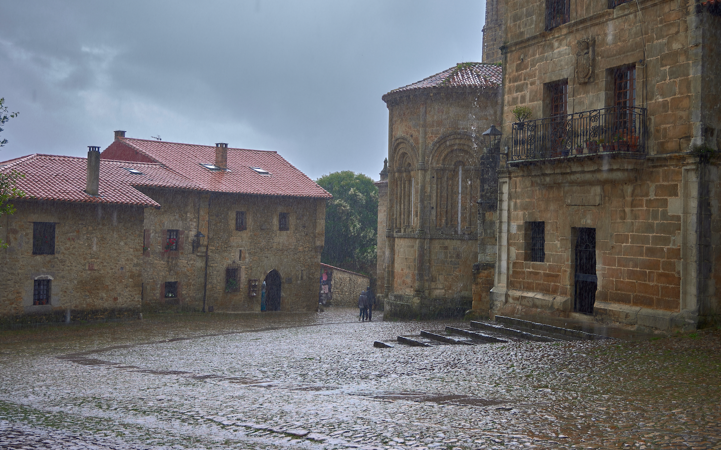 Woman drowns in street as torrential rain causes flooding and major disruption across Spain