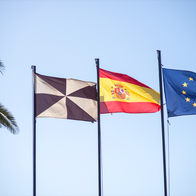Flags at full mast of Ceuta, Spain and the EU.