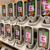 Hand scanners for a supermarket stocked placed in their holders