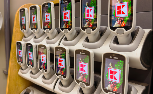 Hand scanners for a supermarket stocked placed in their holders