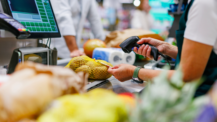 Cashier in a supermarket at the checkout