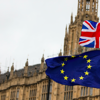 EU and Union Jack flag flying by the house of Parliment