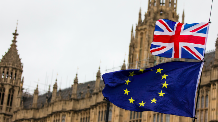 EU and Union Jack flag flying by the house of Parliment