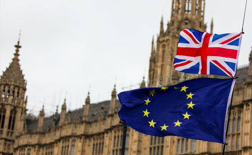 EU and Union Jack flag flying by the house of Parliment