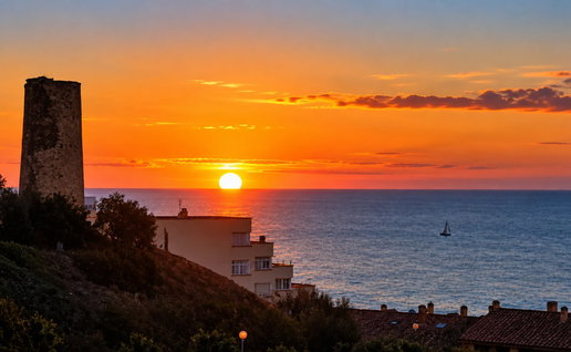 Sunset over the Spanish Mediterranean coast as autumn begins and daylight hours become shorter.