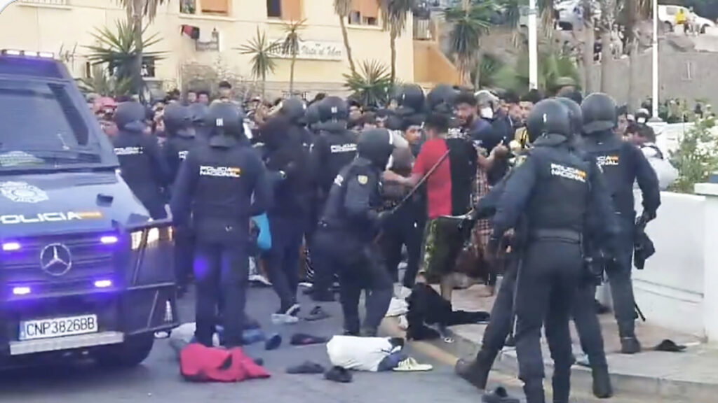 Spain’s answer to the Ceuta crisis opens in chaos as police struggle to contain rush