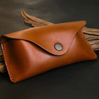 A leather glasses case.