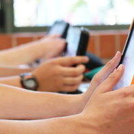 High school students using tablets in class