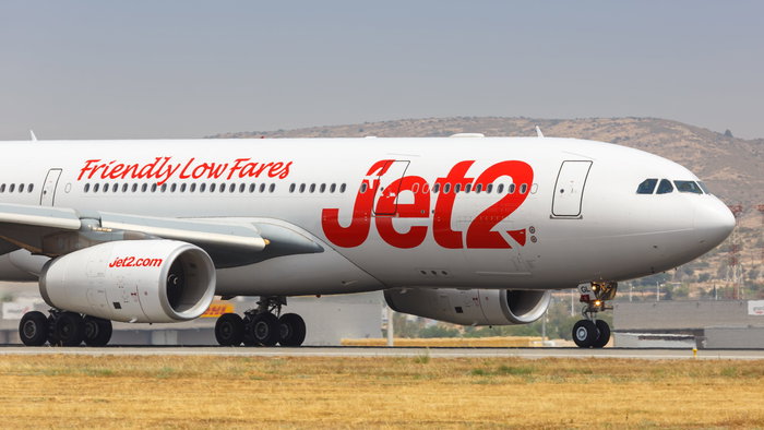 A jet2 aircraft landing at an airport