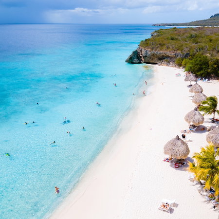 Playa Cas Abao in Curacao a white beach with a blue turqouse colored ocean