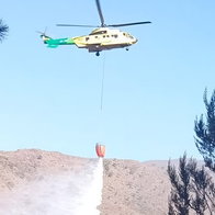 Heavy helicopters drop water in one of biggest operations of year.