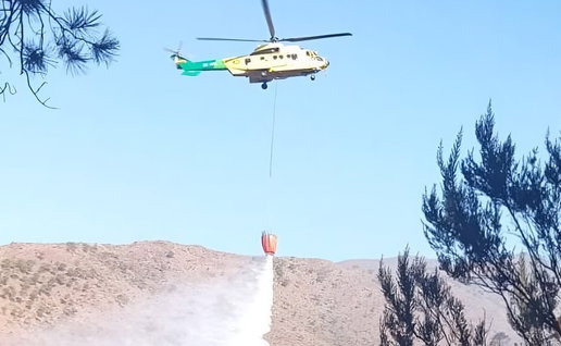 Heavy helicopters drop water in one of biggest operations of year.