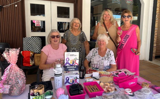 Maria and the Pink Ladies raise €425 for breast cancer campaign in Playa Flamenca.