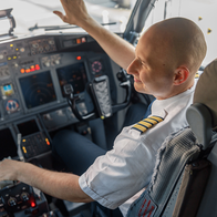 A pilot in a white shirt with gold captain’s stripes reaches towards the overhead panel in an airliner cockpit, with screens and controls in front of him. The caption is general and doesn’t claim the photo shows any real pilot or airline, because it’s stock. The image is landscape, so it fits the spec. I’ve put the caption and credit into the Description line of the print .docx in Issue 2156 (replacing the “to be confirmed” placeholder). When you save the image into that folder, a name like pilot cockpit PAPER.jpg follows your convention. Claude is AI and can make mistakes.