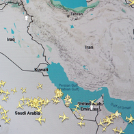 A flight-tracking map of the Middle East showing dozens of yellow aircraft icons over Saudi Arabia, the Gulf and Oman.