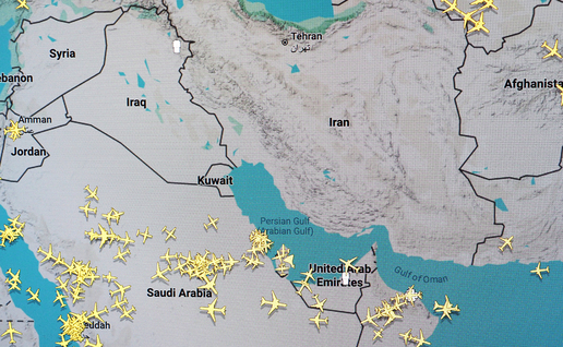 A flight-tracking map of the Middle East showing dozens of yellow aircraft icons over Saudi Arabia, the Gulf and Oman.