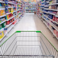 Empty shopping trolley in a supermarket aisle ahead of Spain's 24-hour shopping boycott
