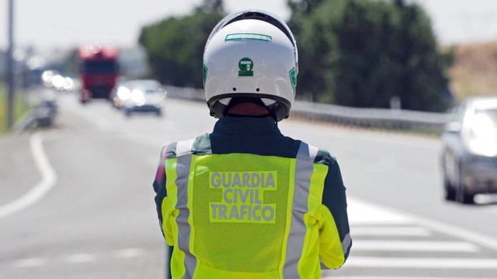 Guardia Civil Trafico officer monitoring road.