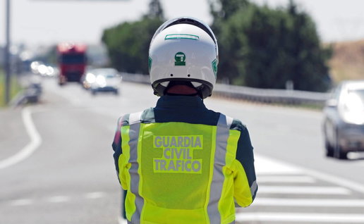 Guardia Civil Trafico officer monitoring road.