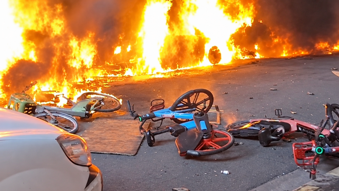 Cars burn in Paris
