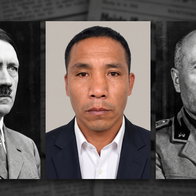 Hitler Mussolini Simeon Flores, newly elected mayor in Peru, pictured between historical portraits of Adolf Hitler and Benito Mussolini.