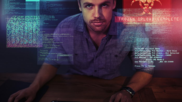 Shot of a young man looking up at messages on a virtual screen