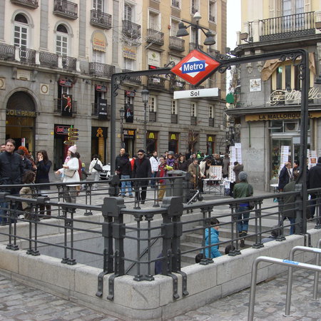 Woman using a laptop to check her rental costs as Spain introduces new rent increase limits.