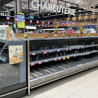 Empty supermarket fridges in France.