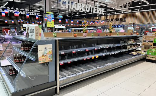 Empty supermarket fridges in France.