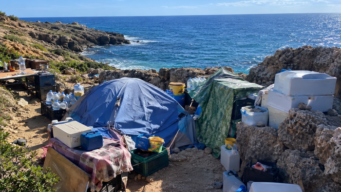 Makeshift settlement on beach