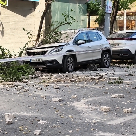 Rubble-strewn street in Granada after August earthquake.