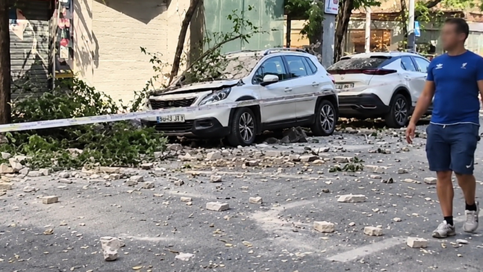 Rubble-strewn street in Granada after August earthquake.
