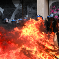 Riot Police barricade themselves together during civil unrest in France