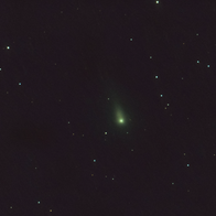 A comet seen shooting amongst stars through the solar system
