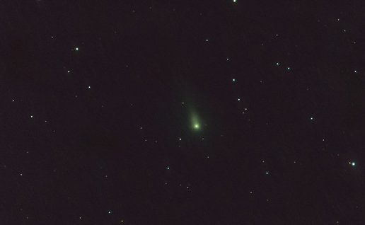 A comet seen shooting amongst stars through the solar system