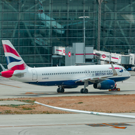 British Airways plane arriving at a terminal in Heathrow